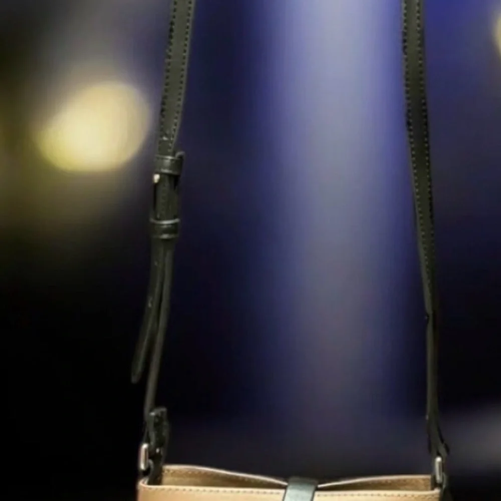 Elegant Tan and Black Crossbody Bag 7x8in with a 22in strap